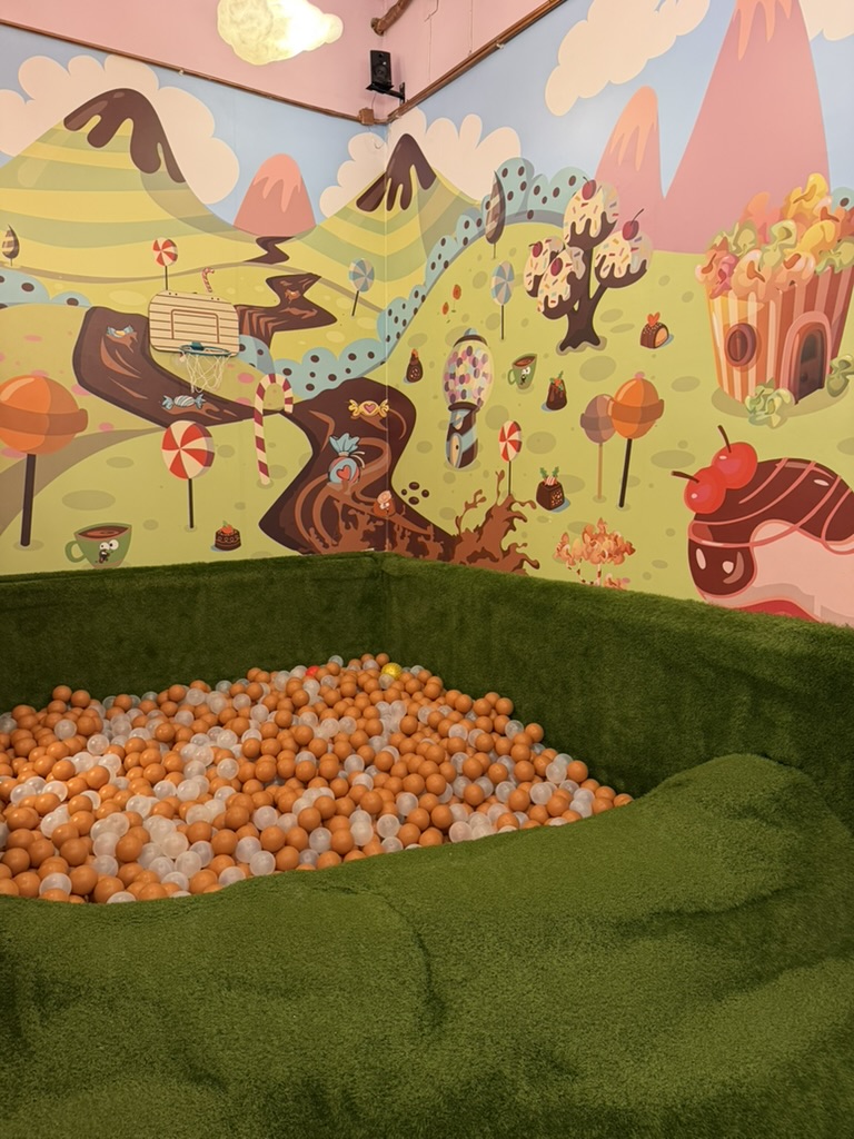 Ball pit and mural at Charlie Restaurant Barcelona